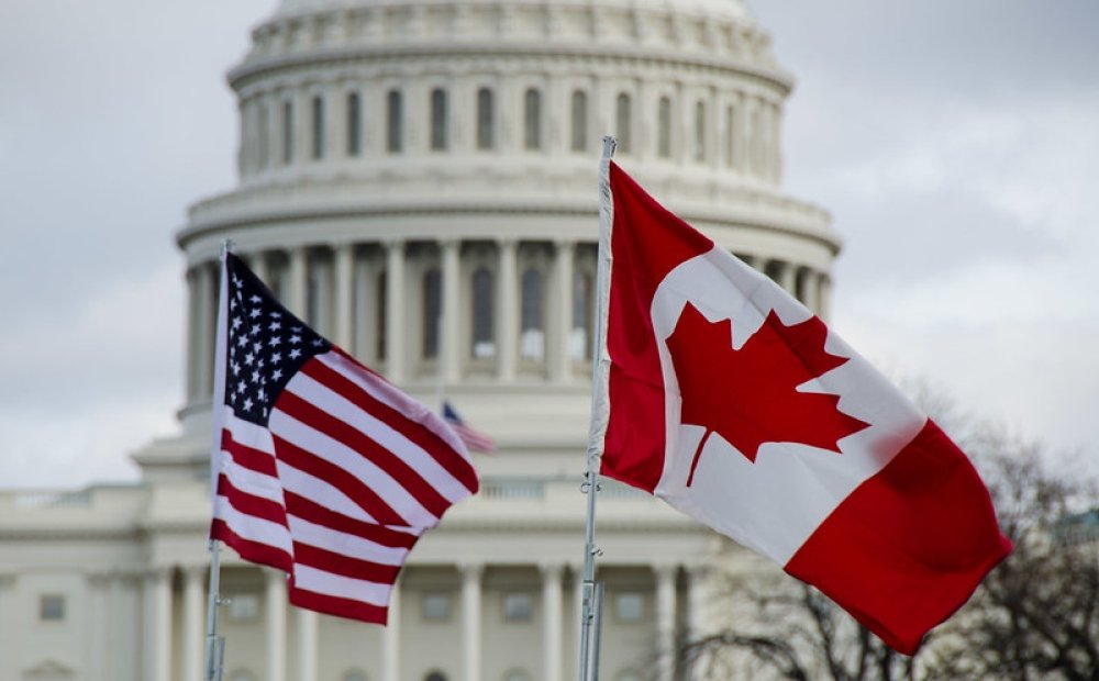 US and Canadian flags at the US Capitol