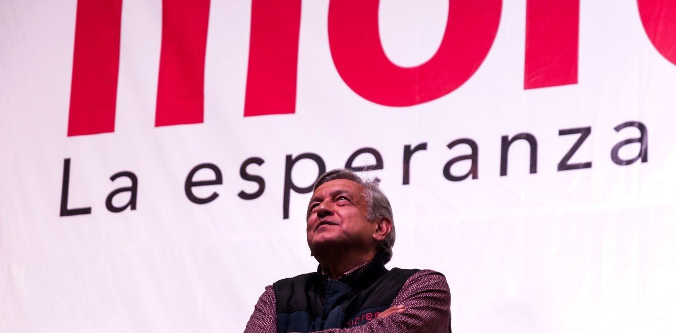 AMLO looking up.