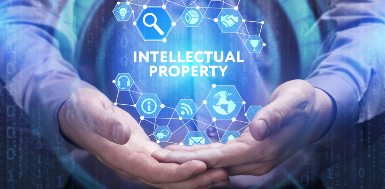 hands holding the words 'intellectual property'