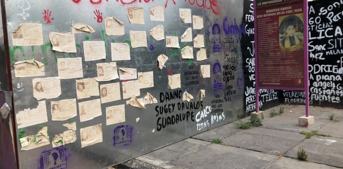 Wall full of messages claiming justice for all the women victims of violence