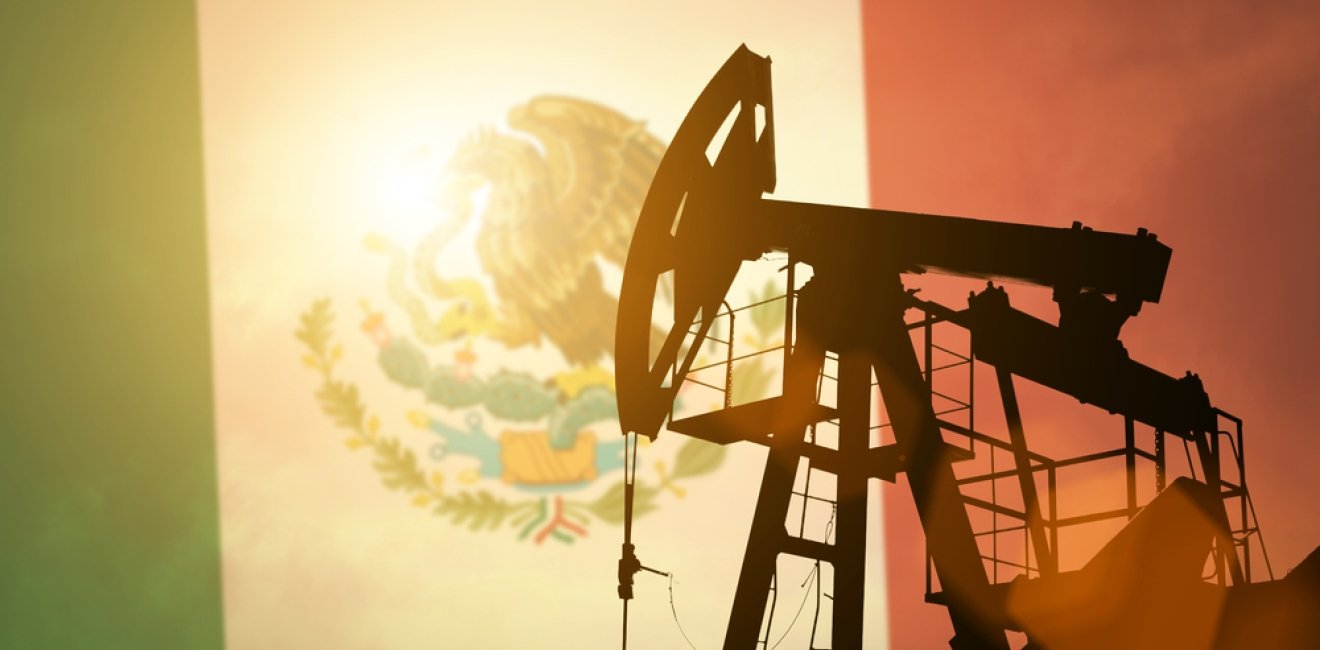 Oil pump on background of flag of Mexico