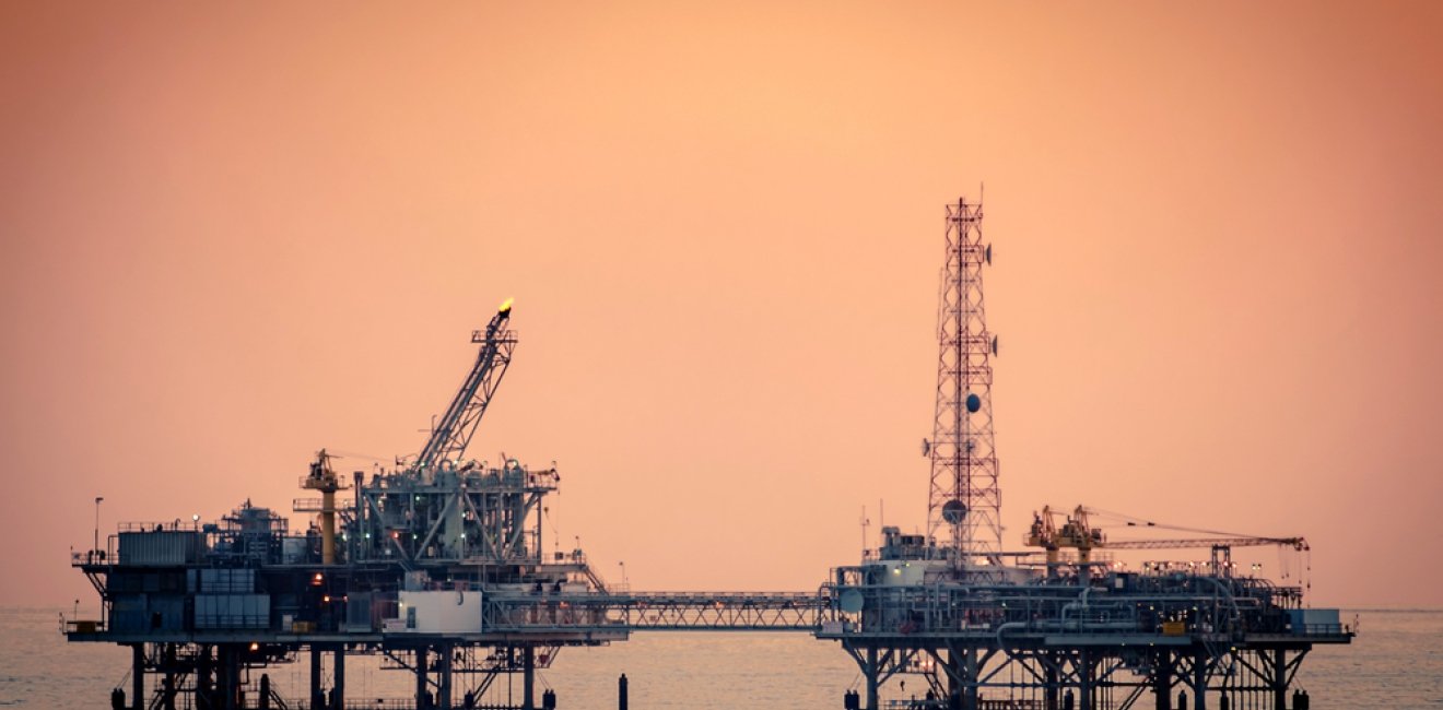 Oil platform silhouette in Gulf of Mexico