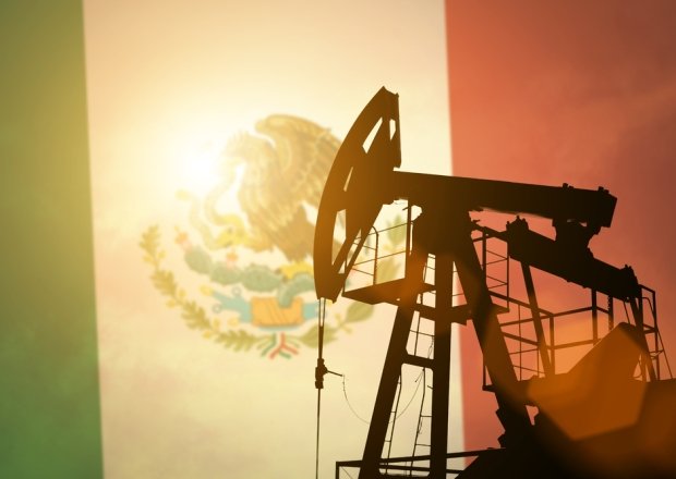 Oil pump on background of flag of Mexico