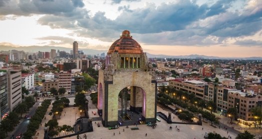 Aerial view of city centre including historical landmark Monument to the Revolution located at Plaza de La Republica in Mexico City, Mexico.