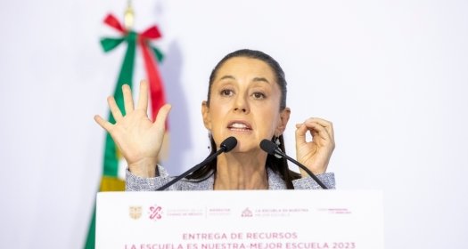 Claudia Sheinbaum, Mexico City's Chief of Government, in a government event where funds were given to citizens for school facilities improvement.