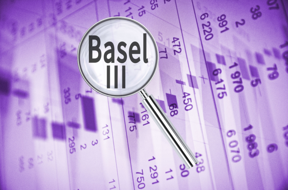 Magnifying lens over words 'Basel III,' with financial data in the background.