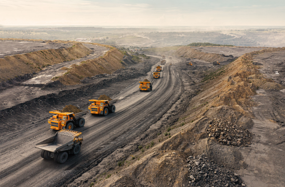 Dump trucks leaving a quarry