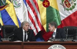 U.S. Secretary of State Antony J. Blinken, right, talks with Secretary General of the Organization of American States (OAS) Luis Almagro at the 52nd OAS General Assembly in Lima, Peru, Thursday, Oct. 6, 2022.